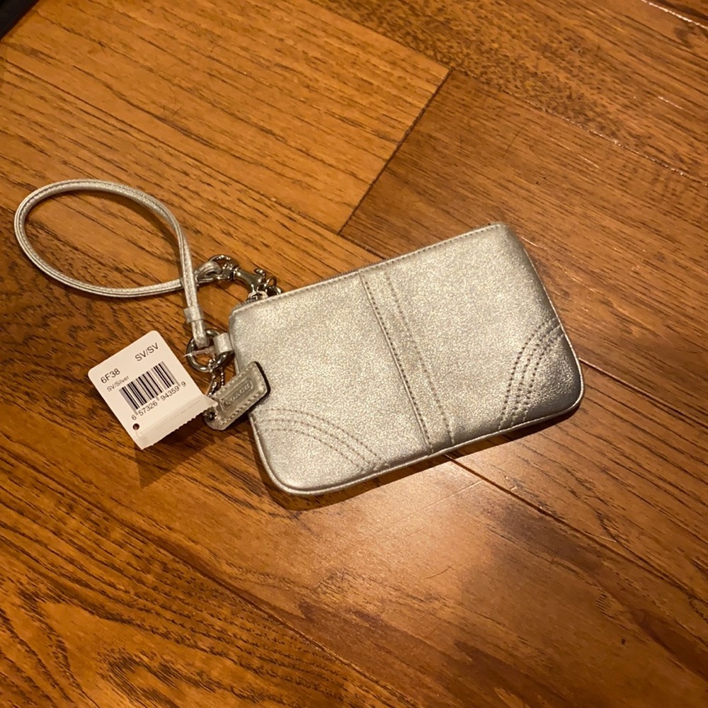 Silver coach wristlet never used